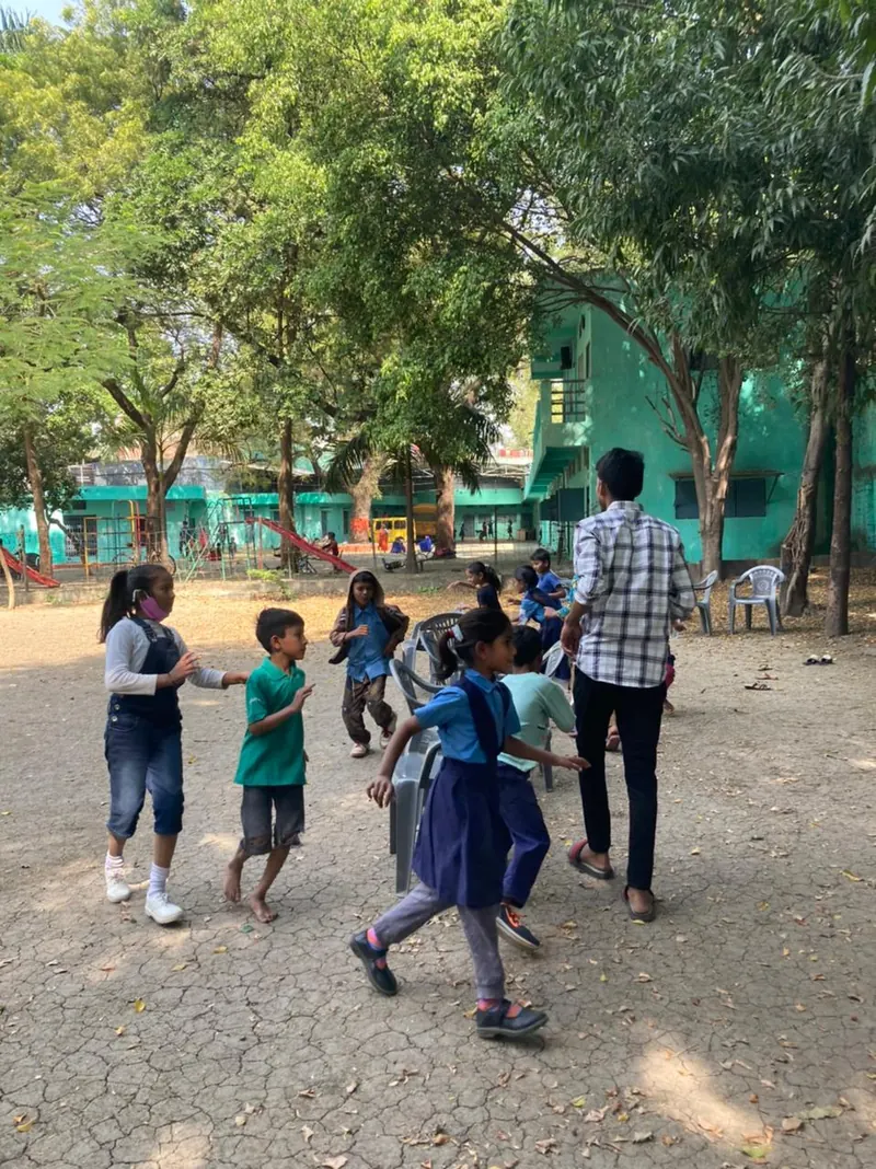 Children running and playing in the school ground
